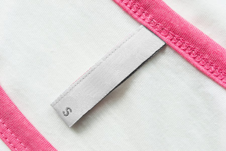 White blank label on cloth as a backgroundの写真素材