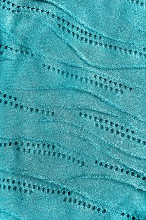 Blue lacyl cloth closeup as a backgroundの写真素材