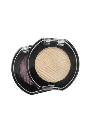 Yellow and brown eyeshadows on white backgroundの写真素材