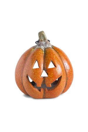 Candlestick in the shape of halloween pumpkin on white backgroundの写真素材