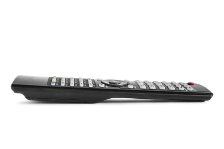 Black TV remote control isolated over whiteの写真素材