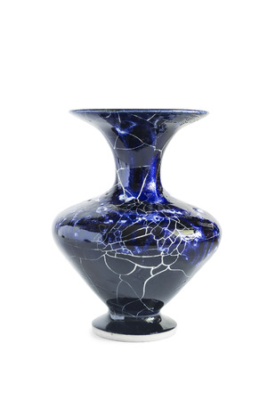 Old blue cracky vase on white backgroundの写真素材