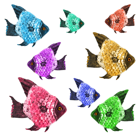 Group of colorful glossy toy fishes on white backgroundの写真素材