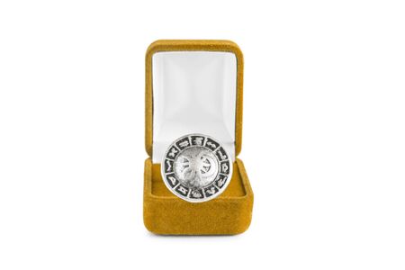 Astrology zodiac silver ring in jewel box isolated over whiteの写真素材