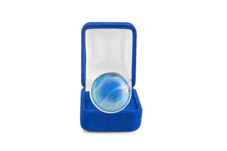 Aquamarine ring in blue jewel box on white backgroundの写真素材