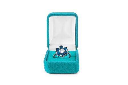 Topaz ring in the shape of flower in jewel boxの写真素材