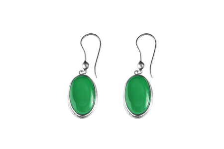 Silver emerald earrings on white backgroundの写真素材