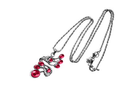 Vintage ruby pendant on a chain isolated over whiteの写真素材