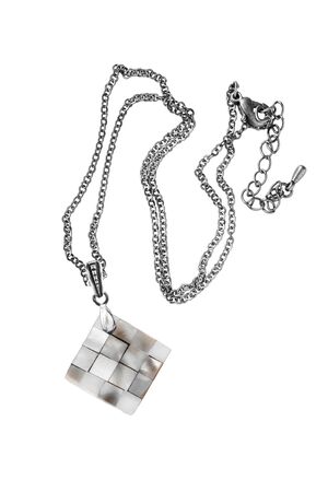 Nacre elegant pendant on a chain isolated over whiteの写真素材