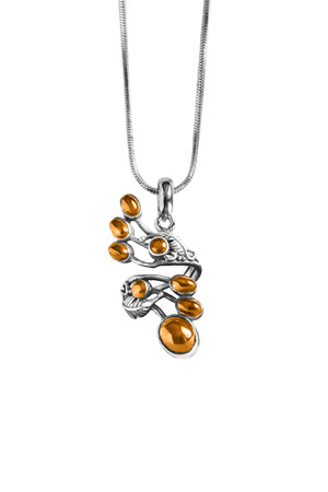 Vintage silver amber pendant isolated over whiteの写真素材