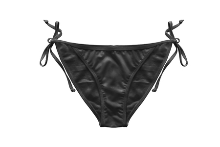 Black bikini bottom with laces isolated over whiteの写真素材