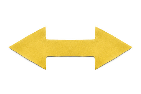 Yellow paper double sided arrow on white backgroundの写真素材