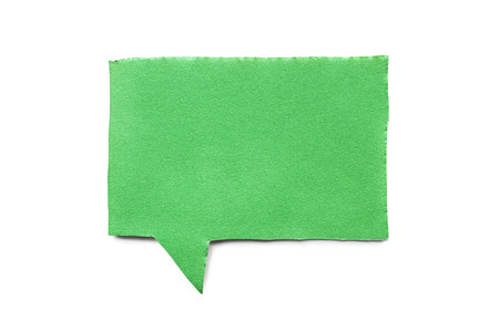 Green paper speech bubble on white backgroundの写真素材