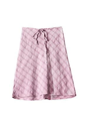 Elegant pink midi skirt on white backgroundの写真素材