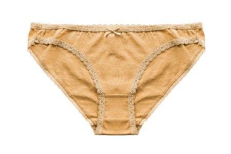 Yellow lacy panties isolated over whiteの写真素材
