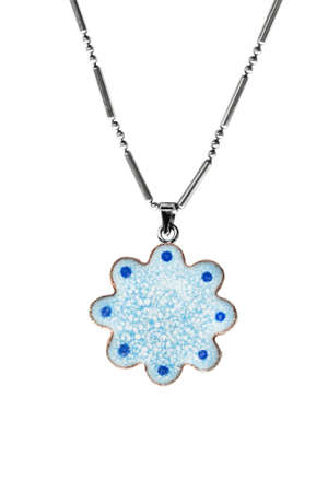 Blue plastic pendant on silver chain on white backgroundの写真素材