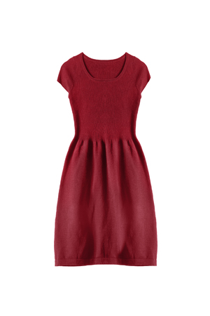 Red knitted sleeveless dress on white backgroundの写真素材
