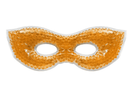 Decorative yellow face mask isolated over whiteの写真素材
