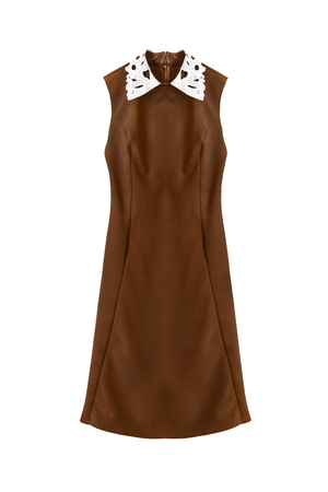Brown sleeveless dress with white collar isolated over whiteの写真素材