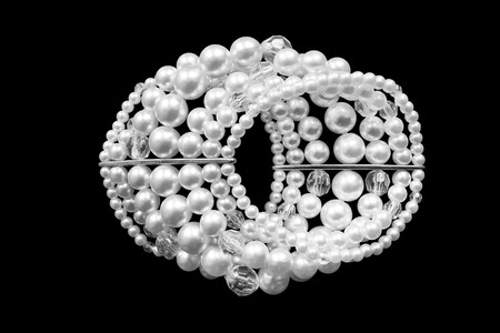 Elegant pearl bracelet on black backgroundの写真素材