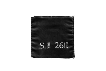 Black clothes label on white backgroundの写真素材