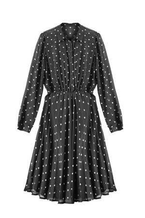 Elegant black chiffon dress with polka dots isolated over whiteの写真素材