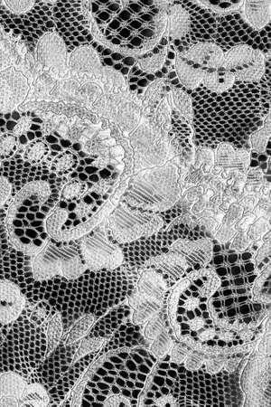 Vintage white lace closeup as a backgroundの写真素材