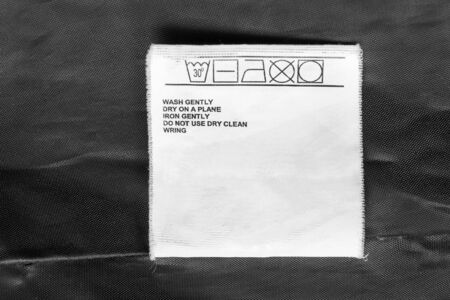 Washing instructions clothes label as a backgroundの写真素材