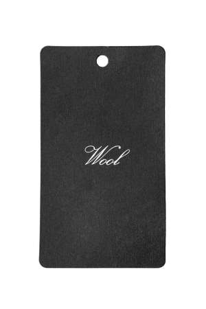 Black carton label with letter wool isolated over whiteの写真素材