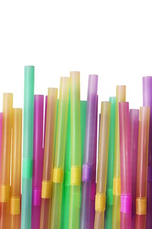 A lot of colorful cocktail sticks on white backgroundの写真素材