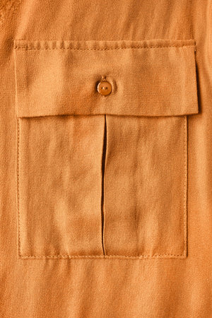 Yellow silk pocket closeup as a background