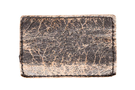 Old leather clothes label on white backgroundの写真素材