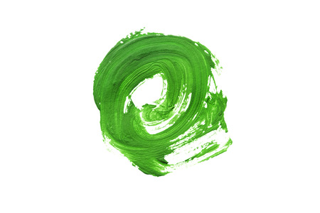 Green paint brush stroke on white backgroundの写真素材