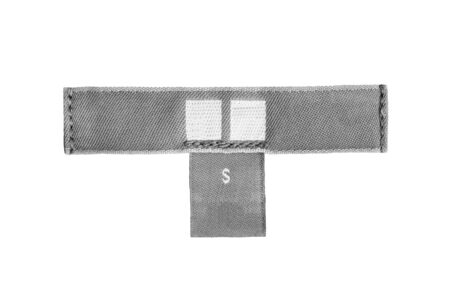 Blank gray clothes label isolated over whiteの写真素材