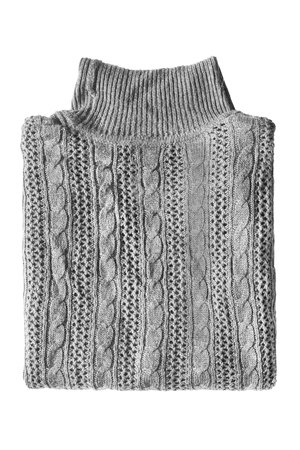 Folded gray knitted sweater isolated over whiteの写真素材