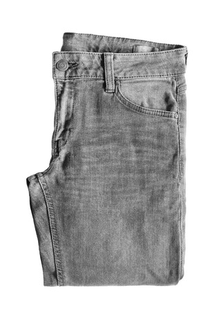 Gray folded jeans isolated over whiteの写真素材