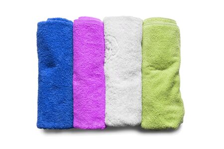 Group of colorful terry towels on white backgroundの写真素材