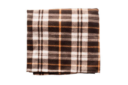 Brown fleece plaid folded on white backgroundの写真素材