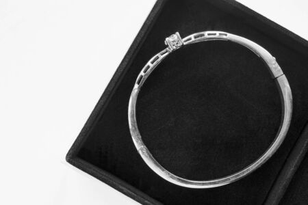 Silver bracelet with one crystal in black jewel boxの写真素材