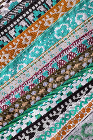 Colorful ethnic embroidered laces as a backgroundの写真素材