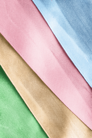Colorful satin ribbons closeup as a backgroundの写真素材