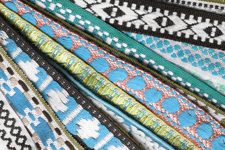 Group of decorative textile ribbons as a backgroundの写真素材