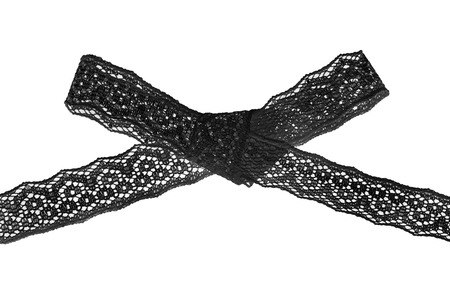 Black tied bow lace isolated over whiteの写真素材