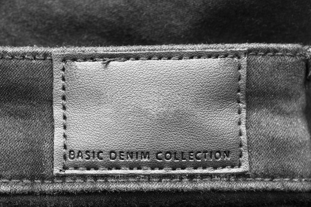 Black label lettered basic denim collection as a backgroundの写真素材