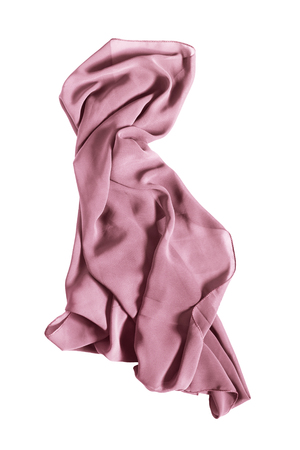 Pink silk kerchief draped on white backgroundの写真素材