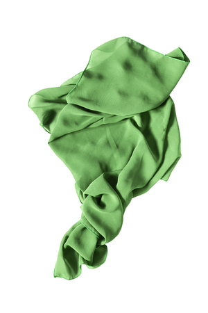 Crumpled green silk kerchief isolated over whiteの写真素材