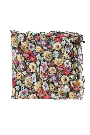 Folded chiffon floral kerchief isolated over whiteの写真素材