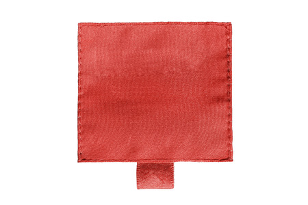 Blank red clothes label on white backgroundの写真素材