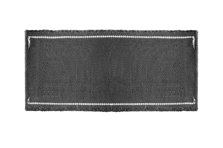 Blank black clothes label isolated over whiteの写真素材