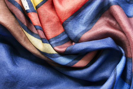 Colorful silk draped cloth as a backgroundの写真素材